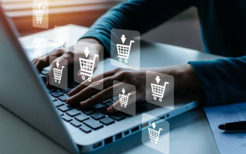Shopping Online. woman hand online shopping on laptop computer with virtual graphic icon diagram on desk, payment online, digital marketing, business finance, internet network technology concept